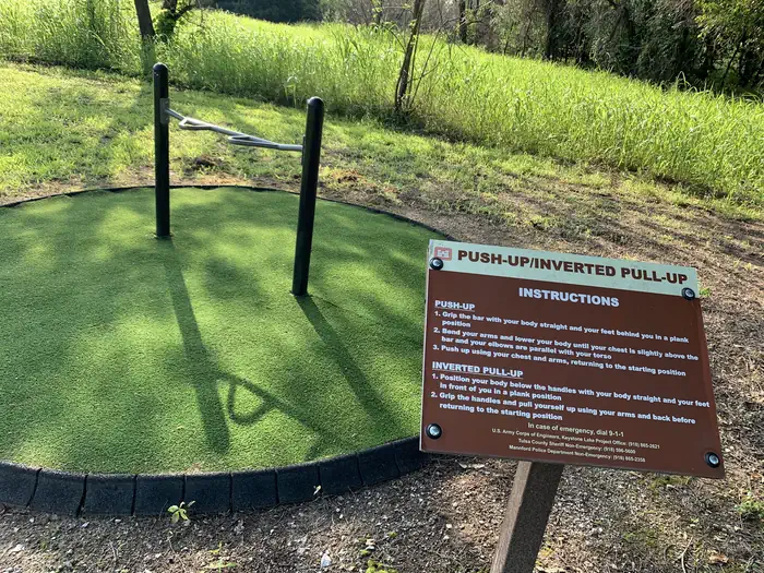 Unique to Keystone Lake, a mile long fitness trail located in Brush Creek offers obstacles. Featured is the push-up/inverted pull-up station which is located at one of four stations on the trail.