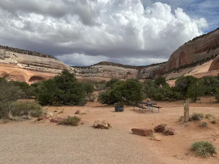 Windwhistle Campground is nestled in a cove of Navajo Sandstone in a pinyon-juniper forest.