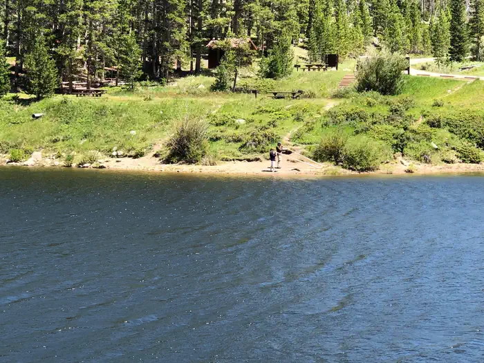 kids at shore of lake