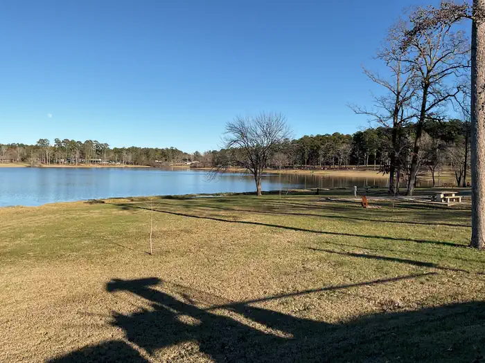 A photo of facility SAN AUGUSTINE with Picnic Table, Fire Pit, Waterfront