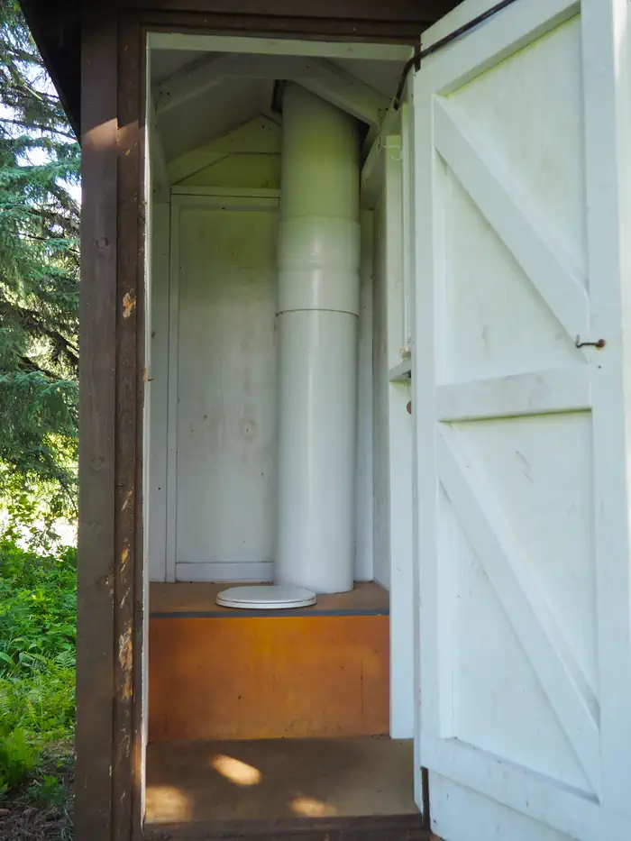 Outhouse interior of Shakes Slough 2 Cabin
