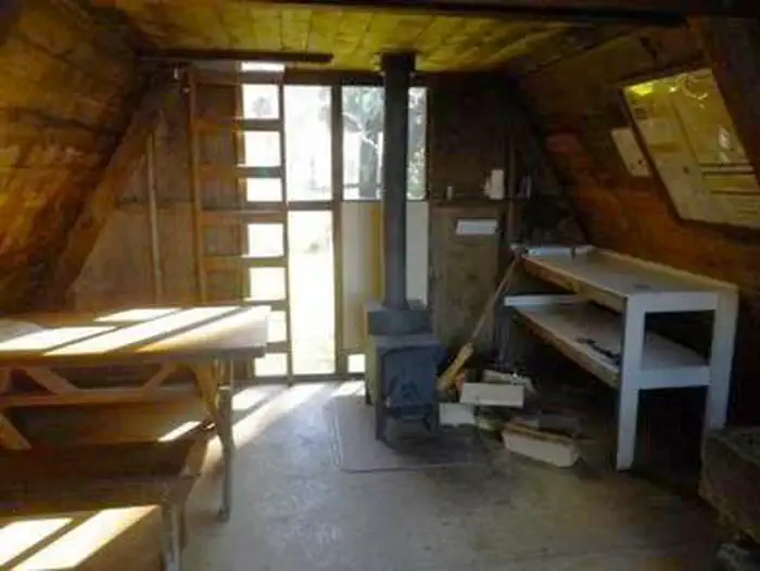 Garnet Ledge Cabin interior with wooden tables and window