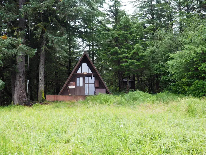 Berg Bay cabin A-Frame and surrounding forest