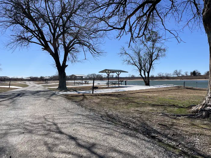 A photo of facility BURNS RUN EAST with Picnic Table, Electricity Hookup, Fire Pit, Shade, Water Hookup