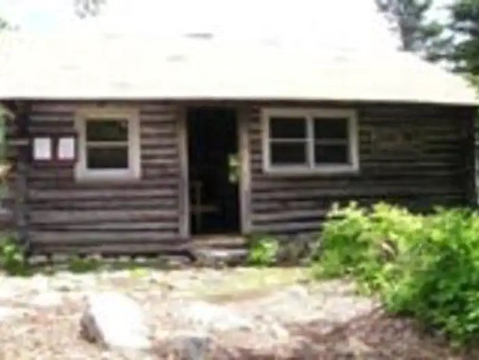 Exterior of a small wooden cabin