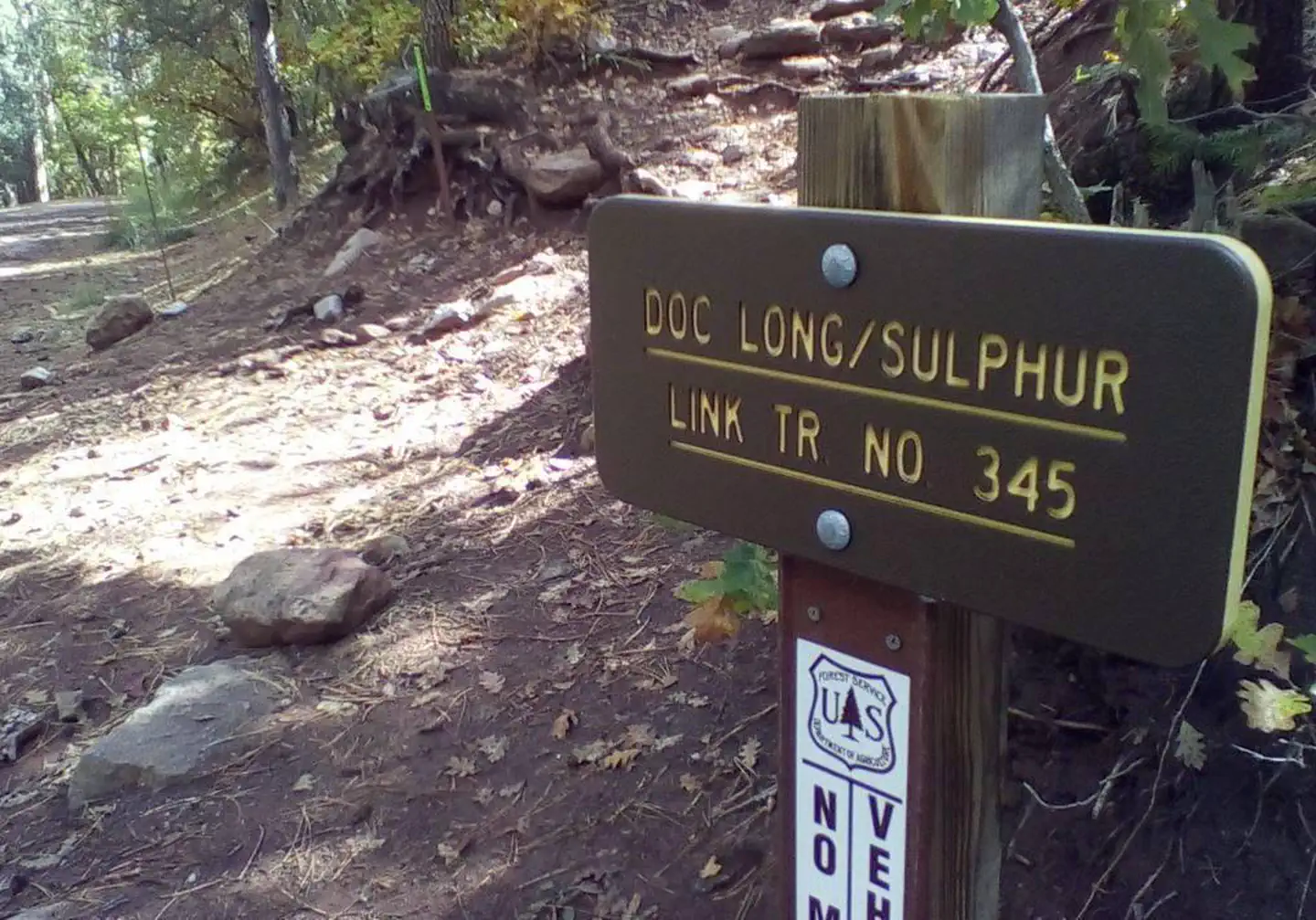this is a picture of a trail sign