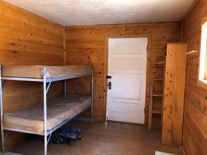 Bunkbeds, shelves and backdoor