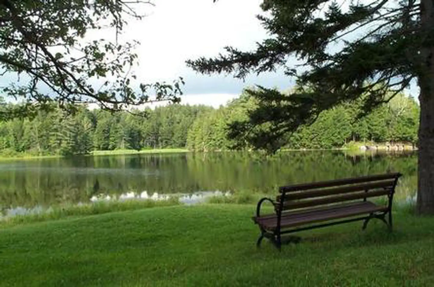 Hapgood Pond with picnic table in foreground