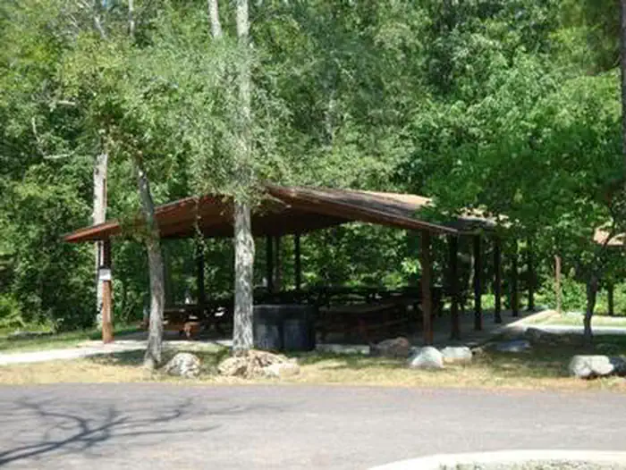 Group Shelter showing picnic tables and grills