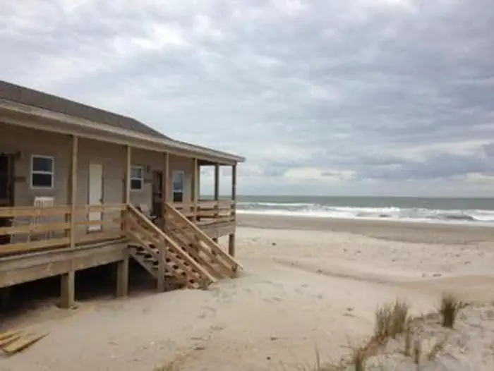 Long Point Cabin Camp with beach in the background