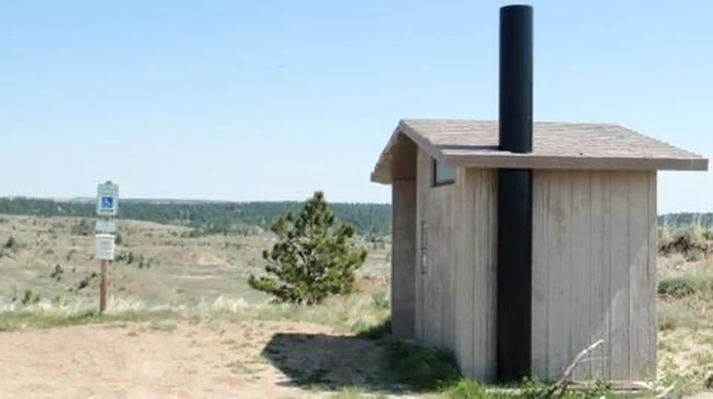 Vault Toilet below the lookout